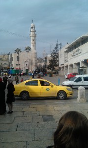 Manger Square, with my back to Church of Nativity. NT era Bethlehem fitted between the two tall towers in the distance.